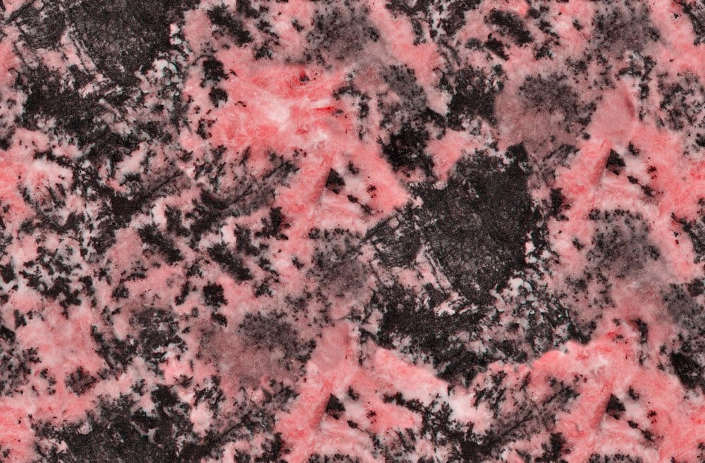 Rhodonite rose veinée de noir manganèse